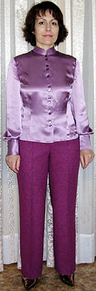 Блузка с втачным рукавом с высокой манжетой.