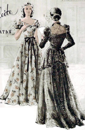 кружевное платье с узкими длинными рукавами, верх которых оформлен буфами.