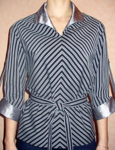 Blouse shirt cut from striped fabric