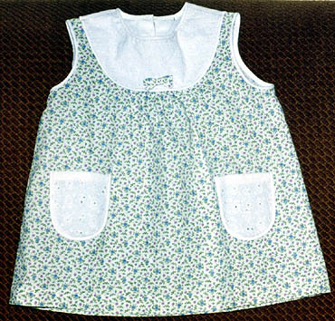 Dress at the yoke for a little girl learning how to cut and sew e-learning through online courses dressmaking sewing